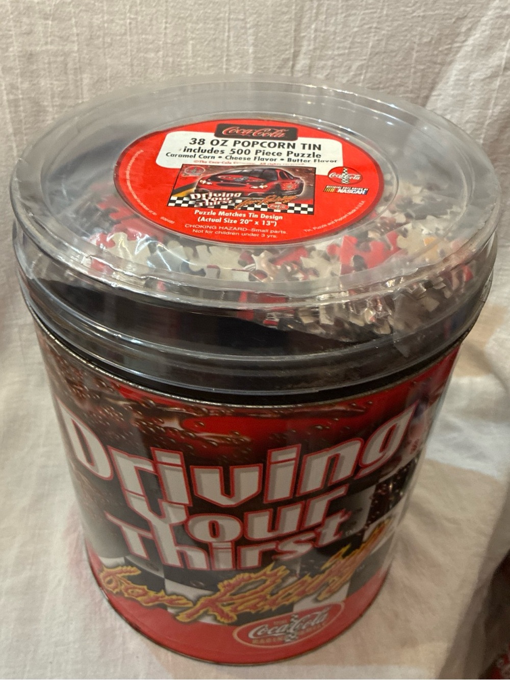 Vintage Coca Cola Red Popcorn Tin Driving Your Thirst for Racing 500 pc puzzle